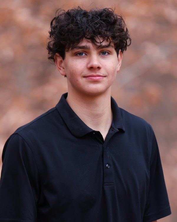 Headshot of Alex Caza